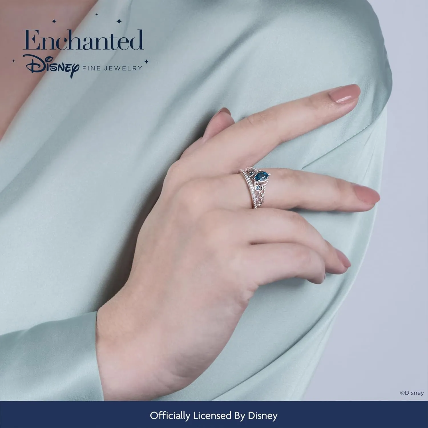 Jewelili Enchanted Disney Fine Jewelry Sterling Silver 6x4 MM London Blue Topaz with 1/10 Cttw Diamonds Cinderella Carriage Tiara Ring